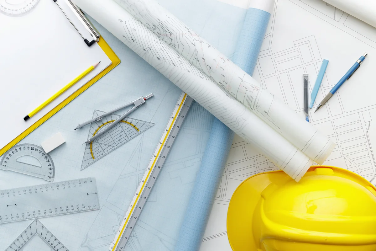 Drawing desk with drawing accessories on a construction site