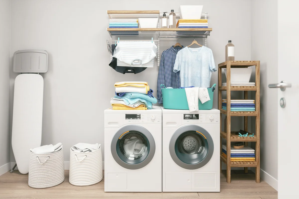 Laundry room with clothes, washing and drying machine