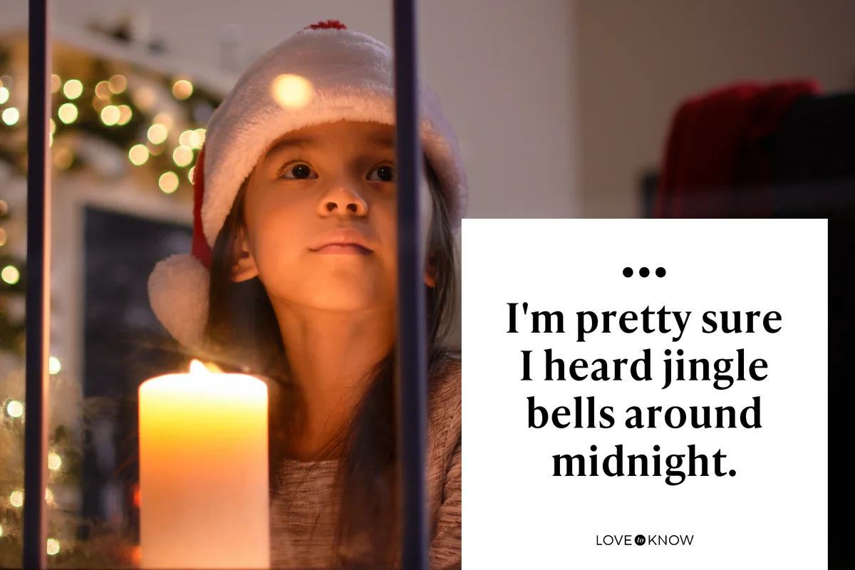 Little girl looking out the window on Christmas