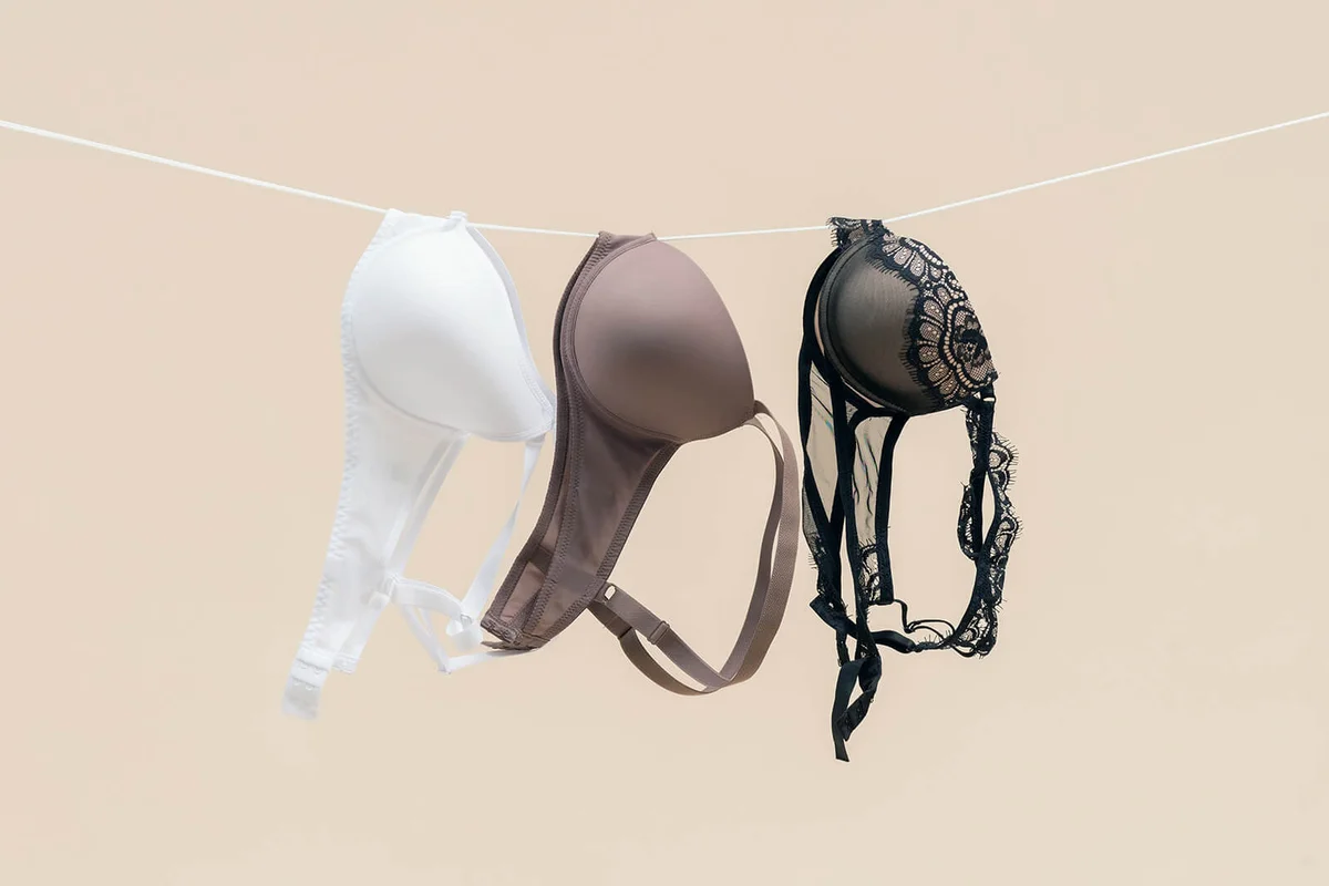 Female bra is hanging on the rope