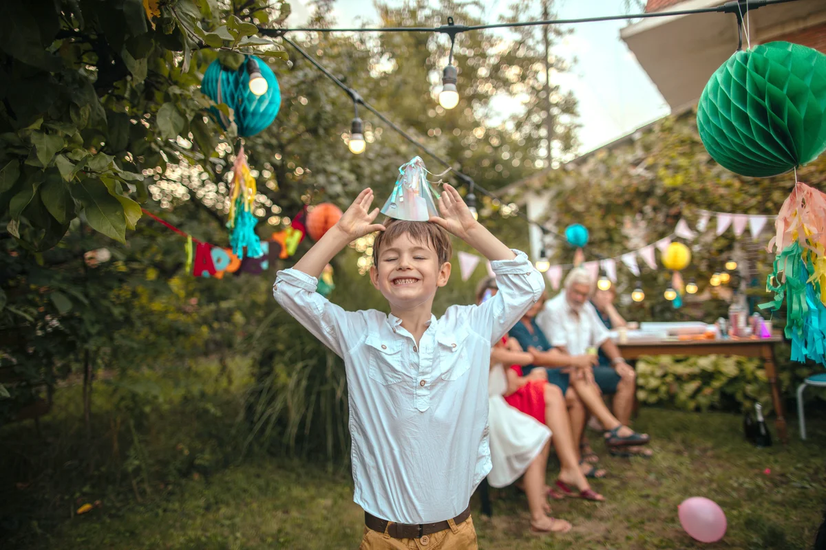 Boy at his outdoor's birthday party