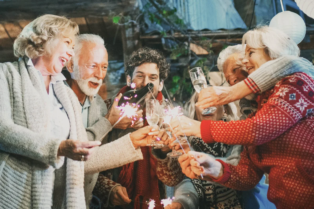 Family having New year's party in a backyard