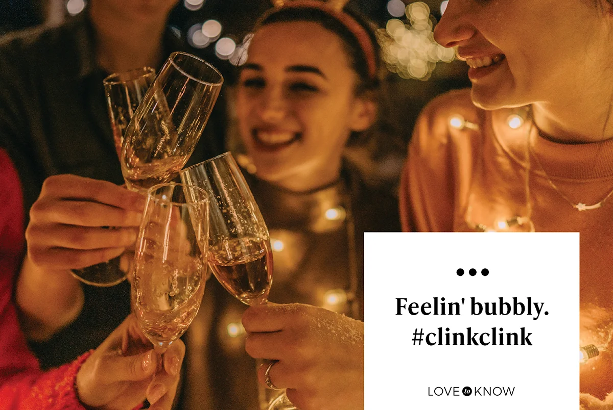 Group of friends toasting with champagne and celebrating New Year's together