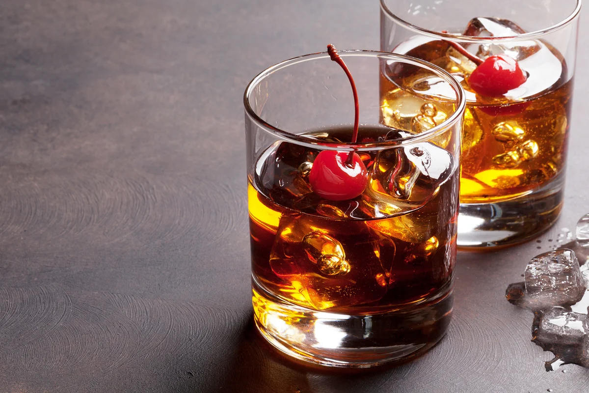 Smoked cherry old-fashioned cocktails