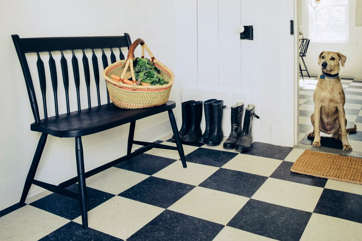 Wooden bench in foyer of country home