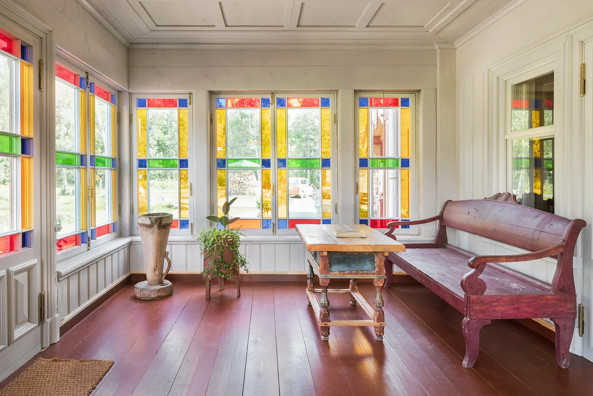 Antique bench in an enclosed porch