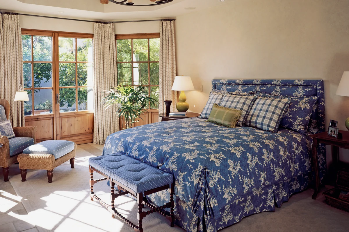 Upholstered  bench at foot of bed
