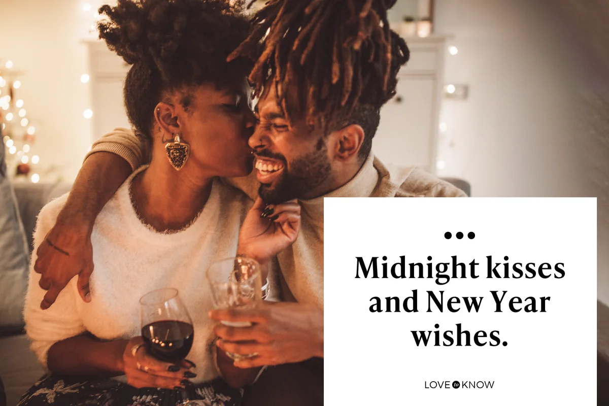 New year couple kissing on the couch
