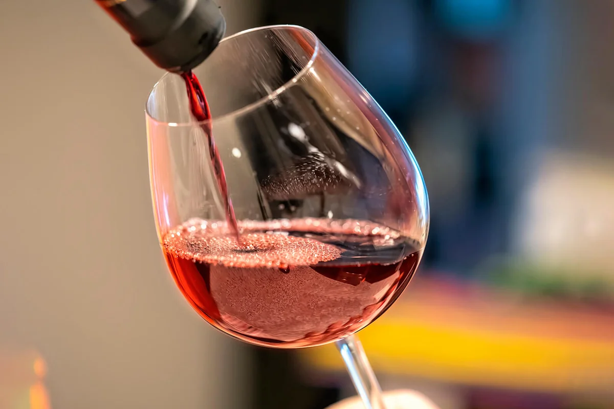 Pouring Wine in Glass