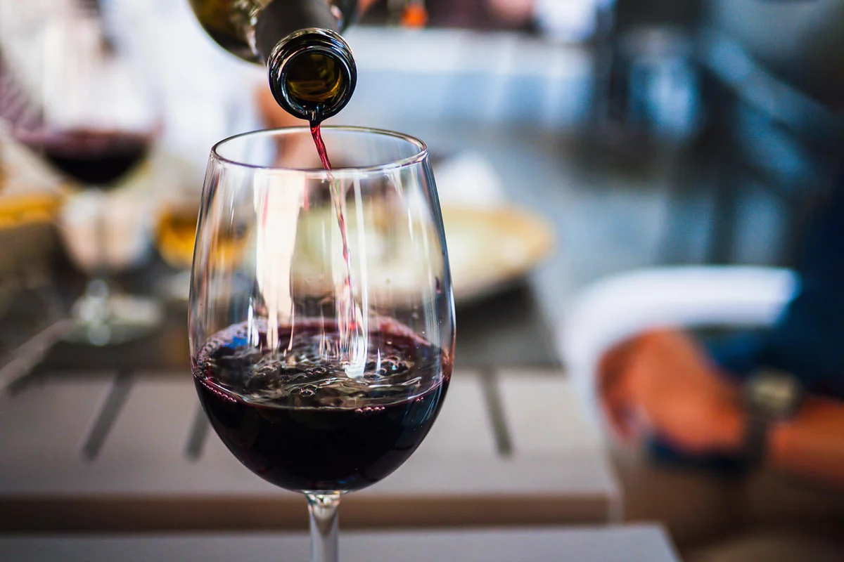 Serving red wine