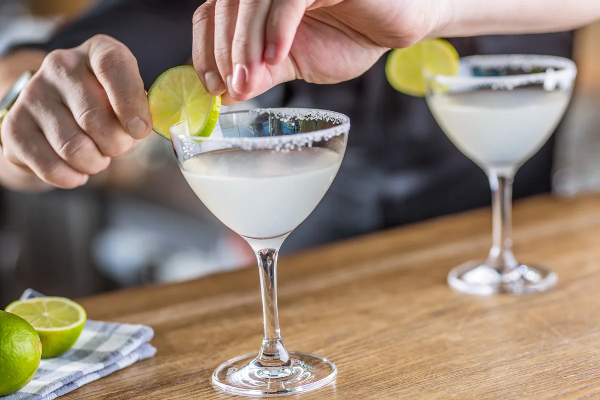 Man preparing Margarita cocktails