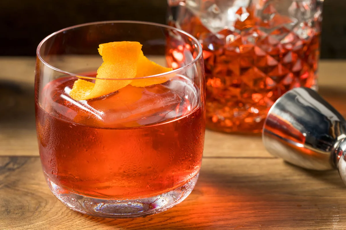 Refreshing Boozy Gin Negroni Cocktail with Orange Garnish