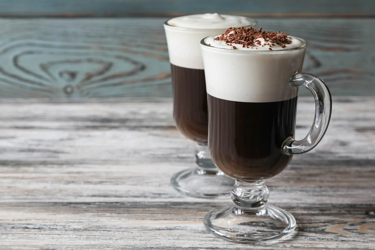 Two different Irish coffee glasses