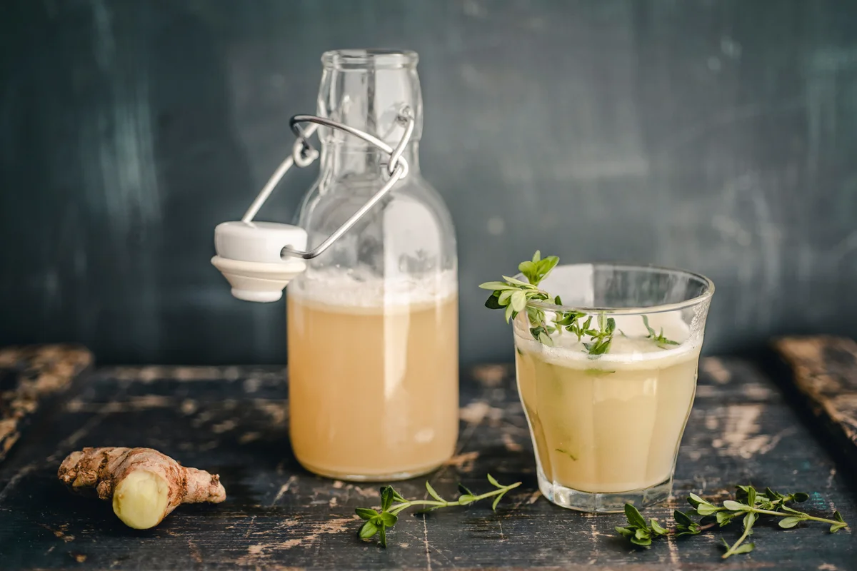 Glass and bottle of Switchel