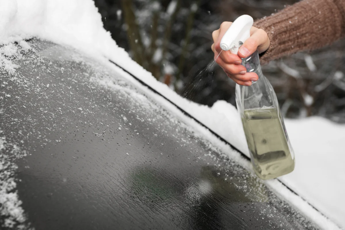 Defrosting the Windshield with an Anti Ice Spray