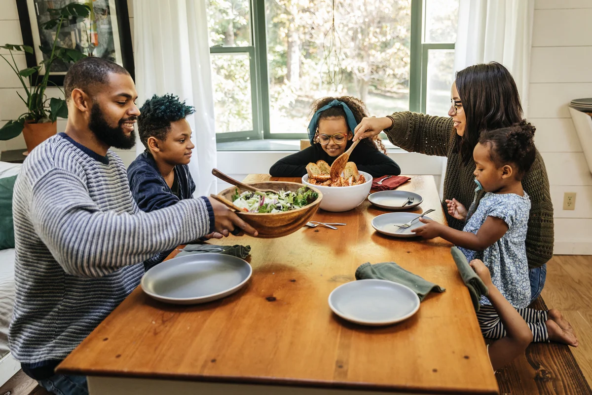 High angle view of family having meal together