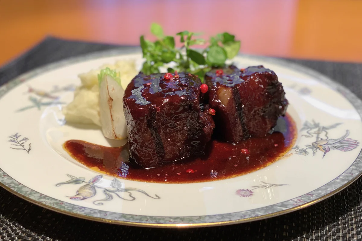 Stewed pork with red wine reduction