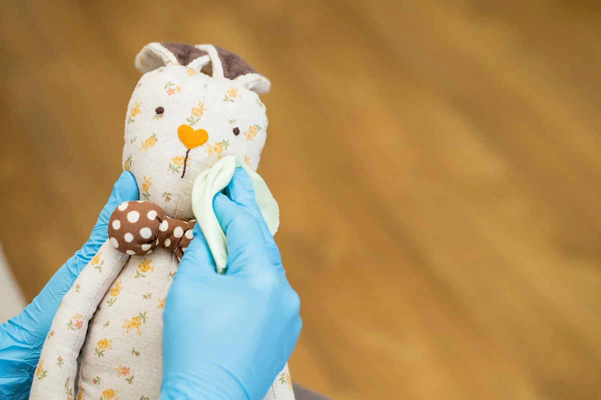 Cropped Hands Wearing Stuffed Toy