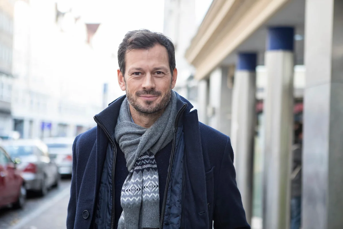 Mature man walking in the street