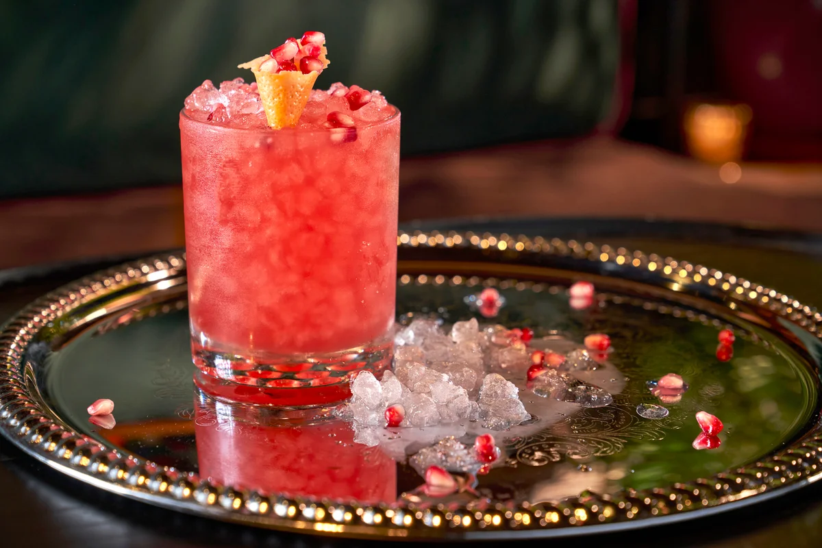 Red cocktail with pomegranate