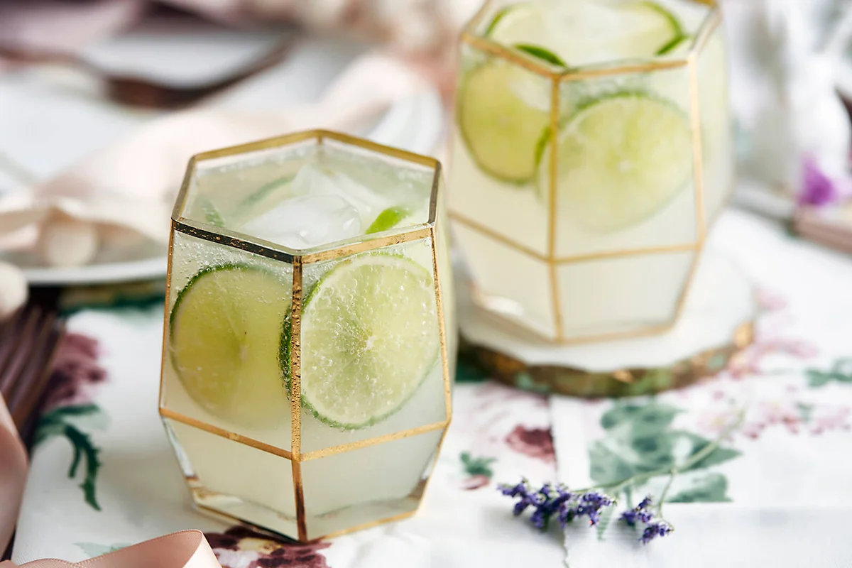 Mocktails garnished with slices of lime