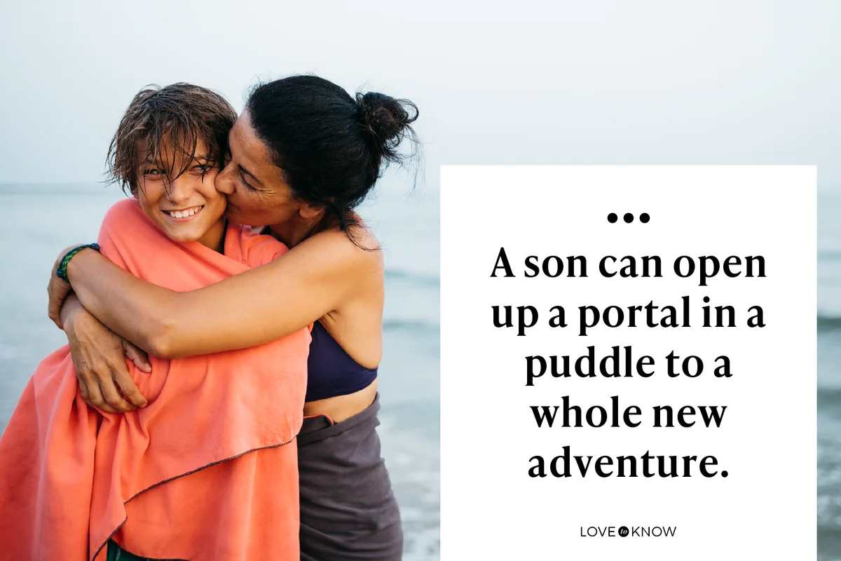 Woman and her son embracing on the beach