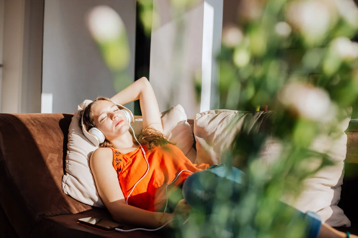 Woman relaxing in sunlight