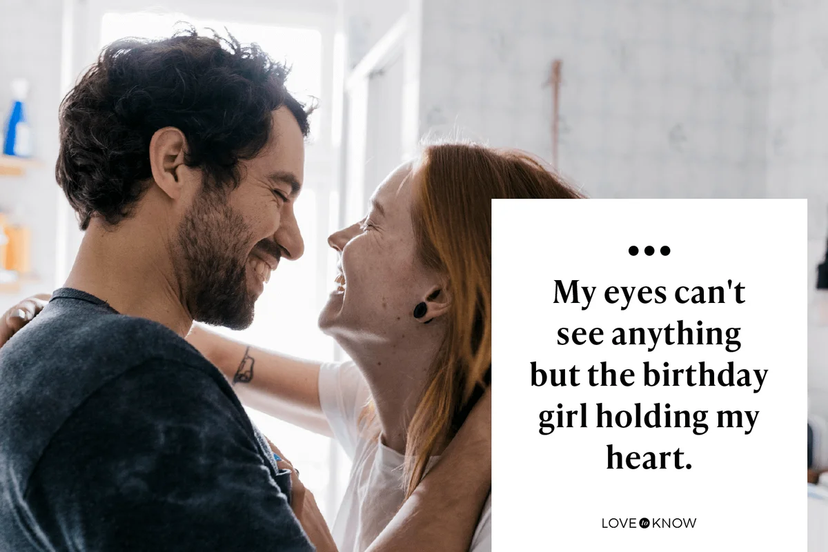 Couple Affectionately Embracing And Smiling Together