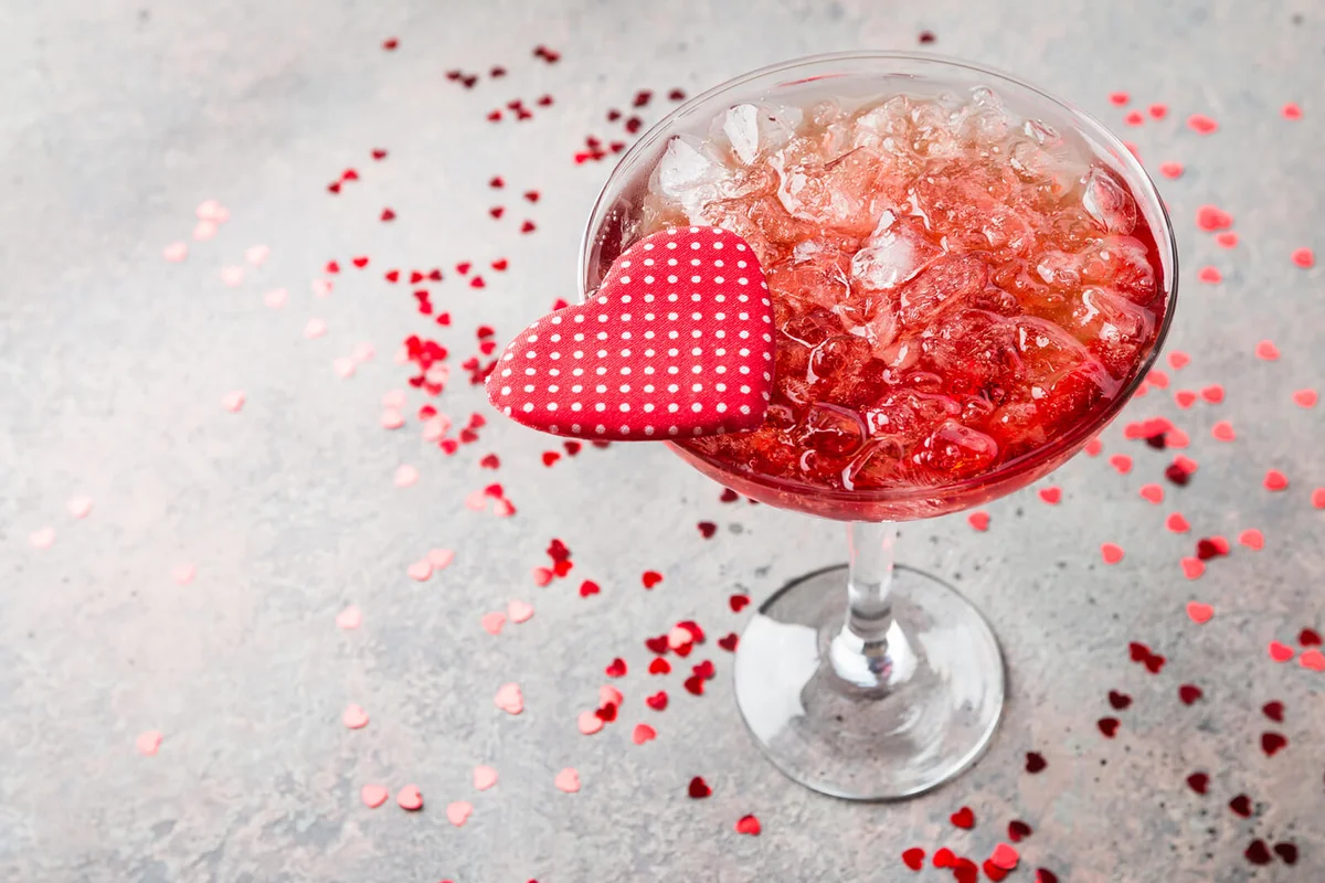 Fresh red margarita cocktail with hearts