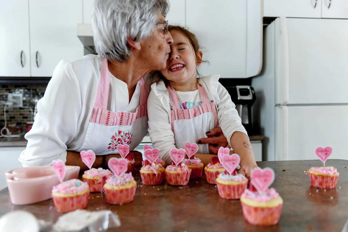 Grandmother and grandchild cooking