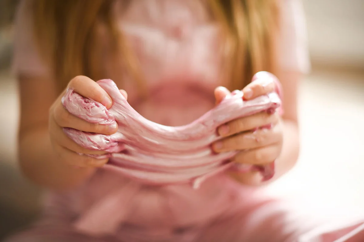 irl playing with her slime