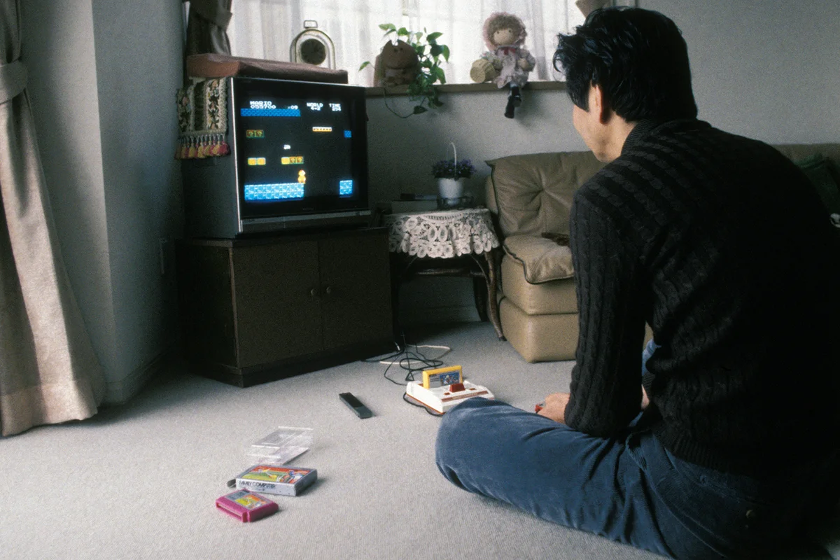 Man Playing Super Mario, 1986