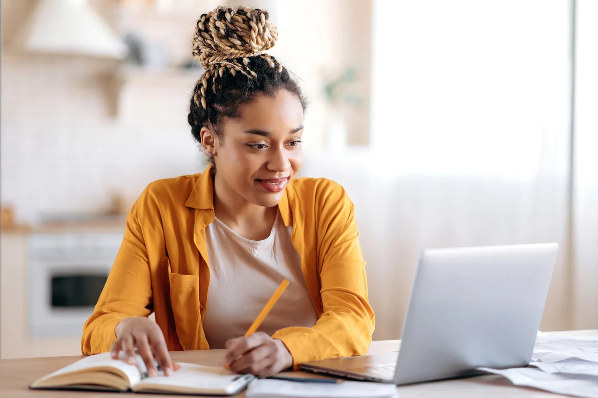 Teen girl taking an online class