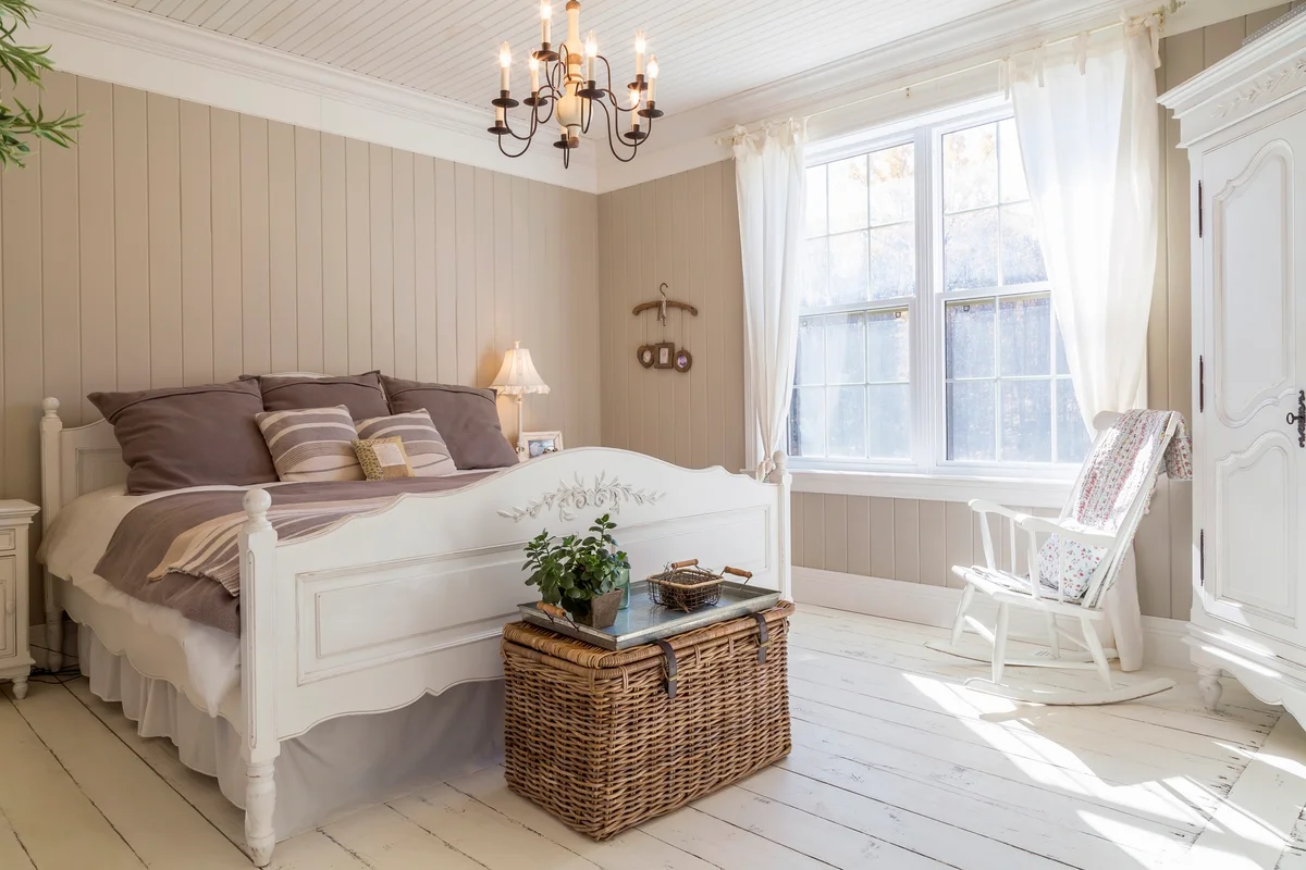 Romantic bedroom with trunk for extra storage