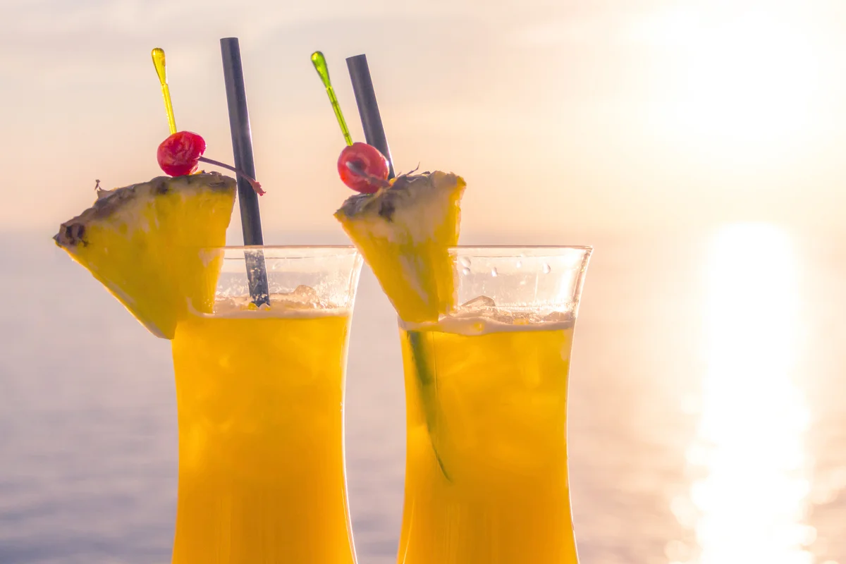 Banana Sunrise Cocktail At Sunset