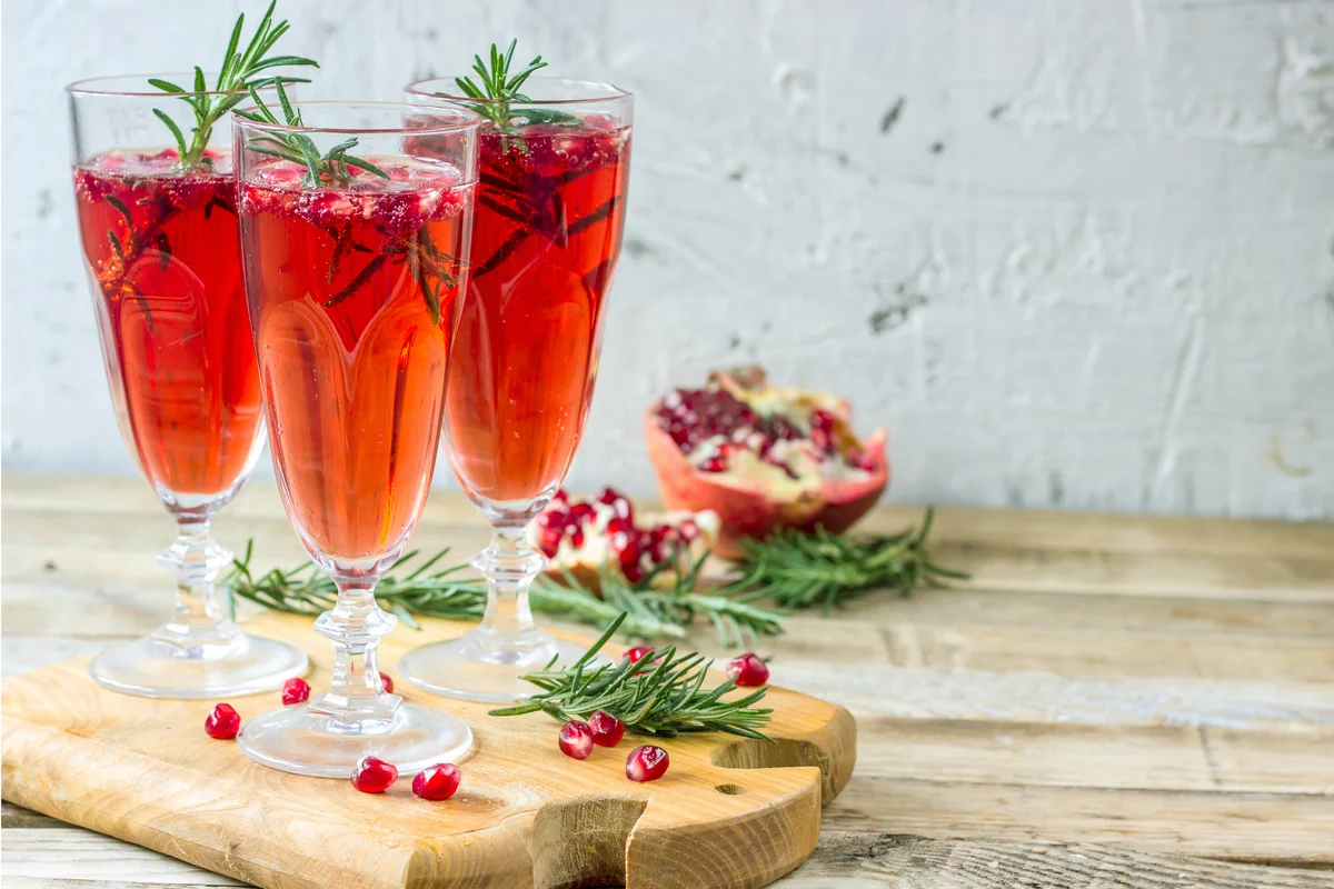 Pomegranate Mocktails on wooden board