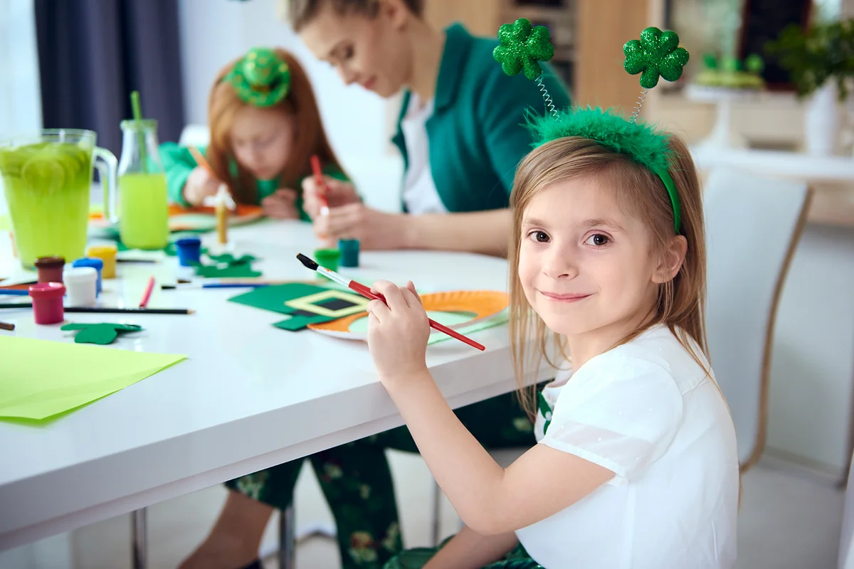 Portrait of girl painting decoration at Saint Patrick's Day