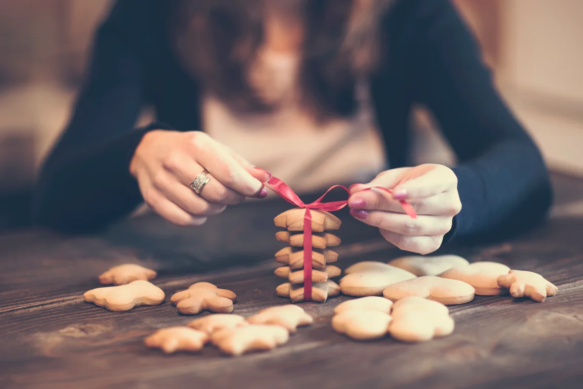 Woman preparing sweet party favors