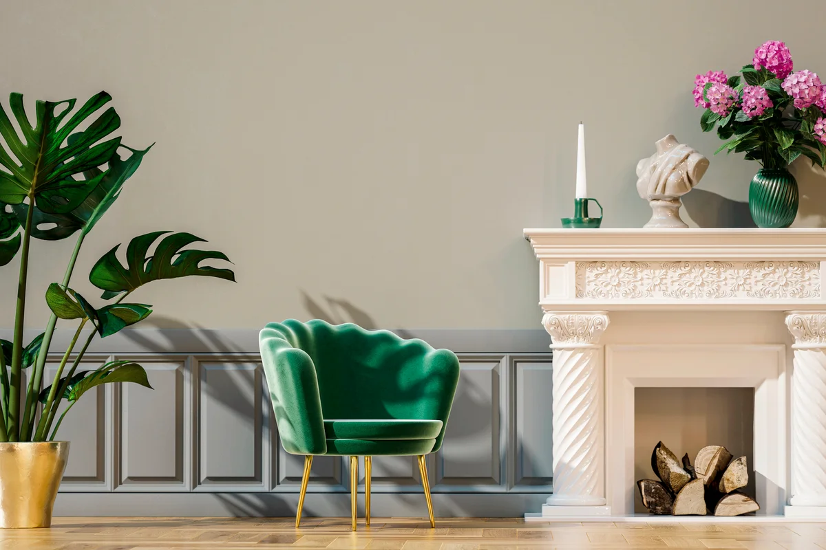 Living room with single chair, potted plant, wall panels and fireplace