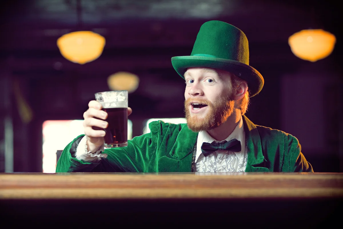 Irish Character / Leprechaun Toasting with a Pint of Beer