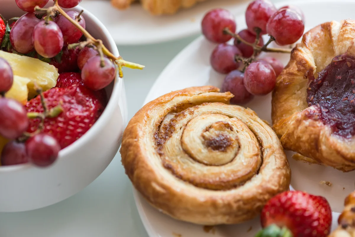 continental breakfast with pastry and fruit