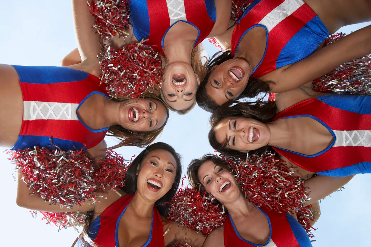 cheerleaders in a huddle