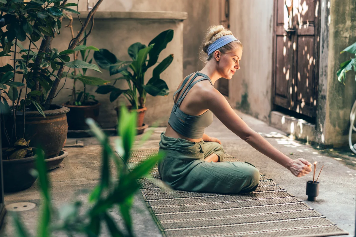 Woman doing yoga outdoors