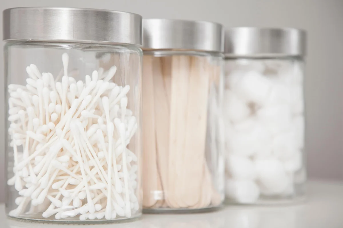 Cotton swabs in transparent jars