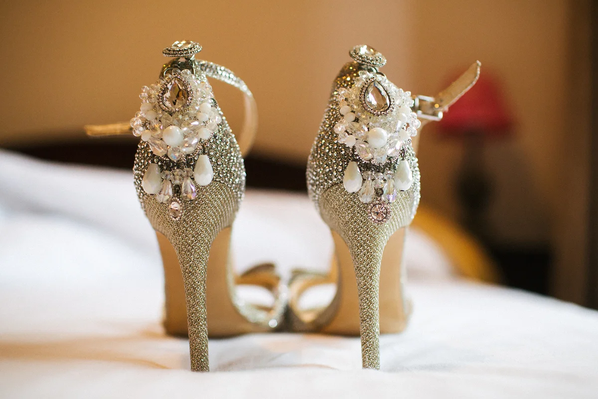 Luxury pearl earings on wedding high heels