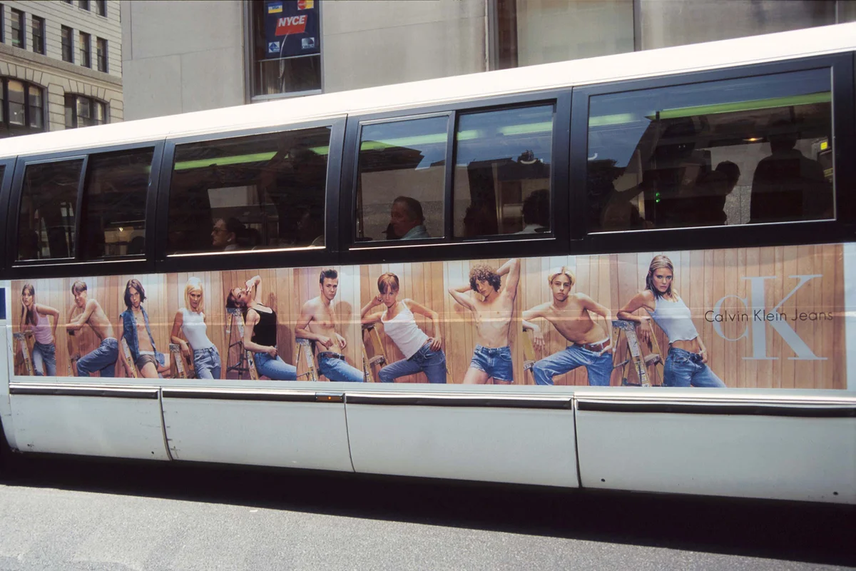 A Calvin Klein advertisement is displayed on a city bus August 23, 1995 in New York City - Getty Editorial
