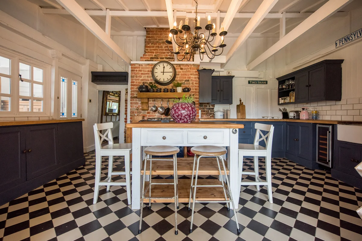A general interior view of an old English country cottage style kitchen,
