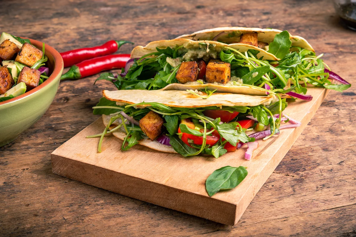 Tacos with vegetables and fried vegan tofu cheese