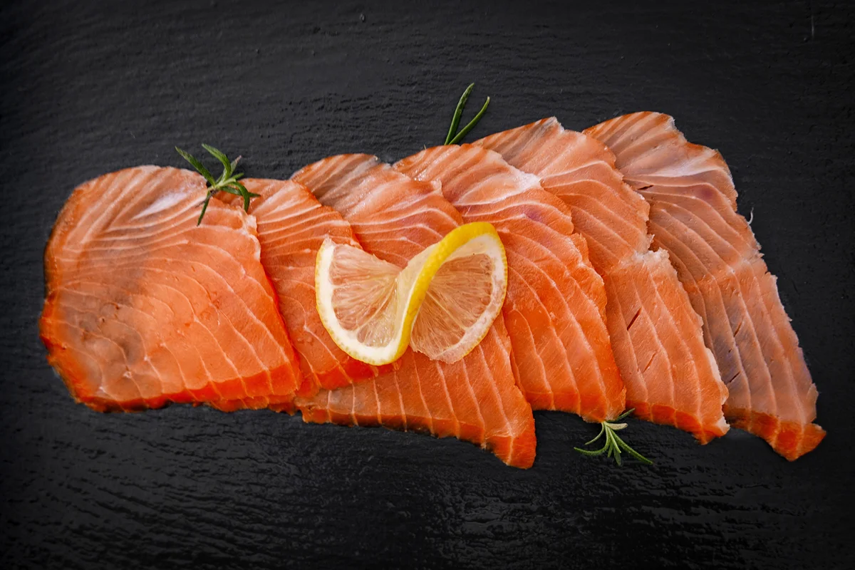Smoked Salmon On Black Background