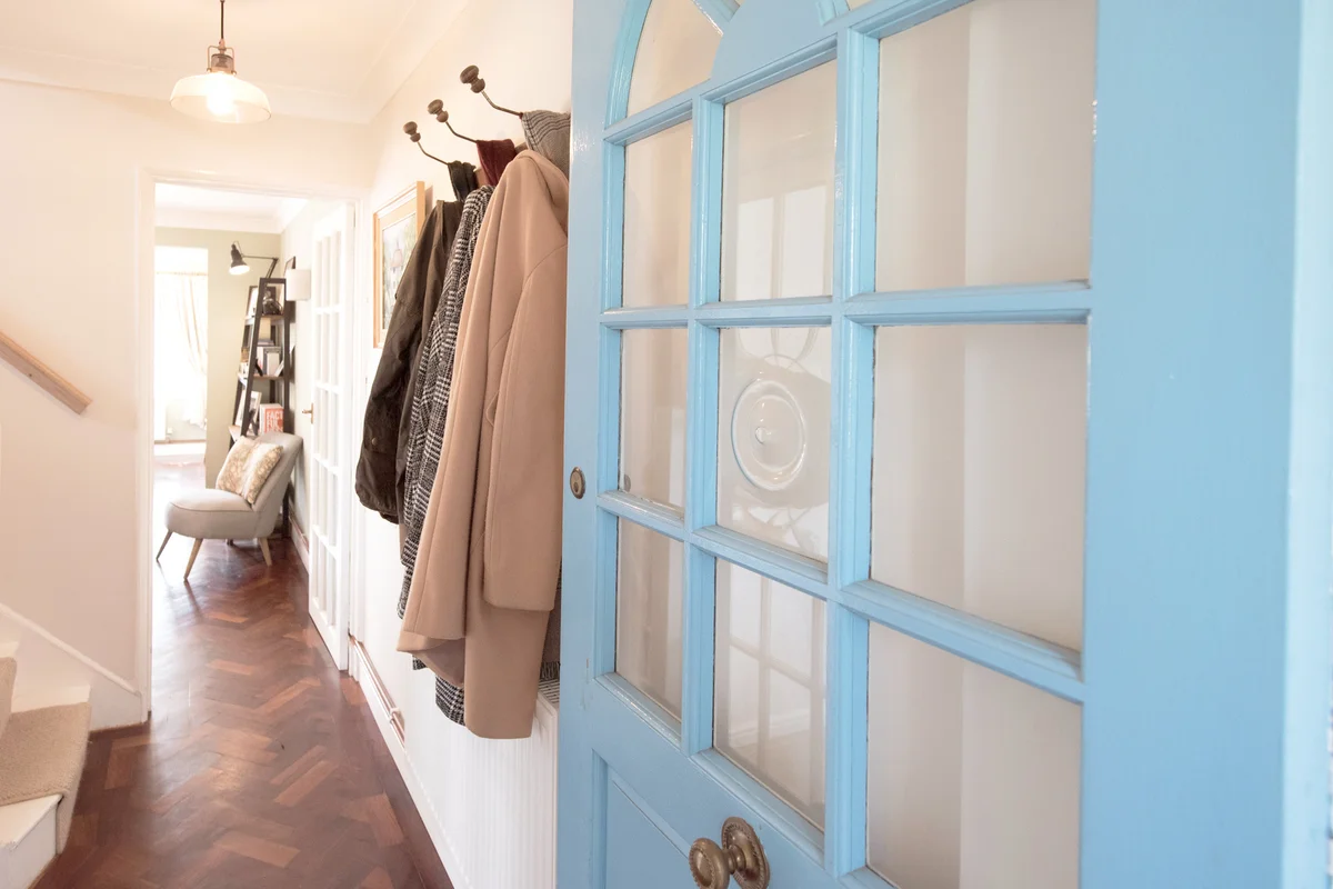 Coats hanging in the entryway